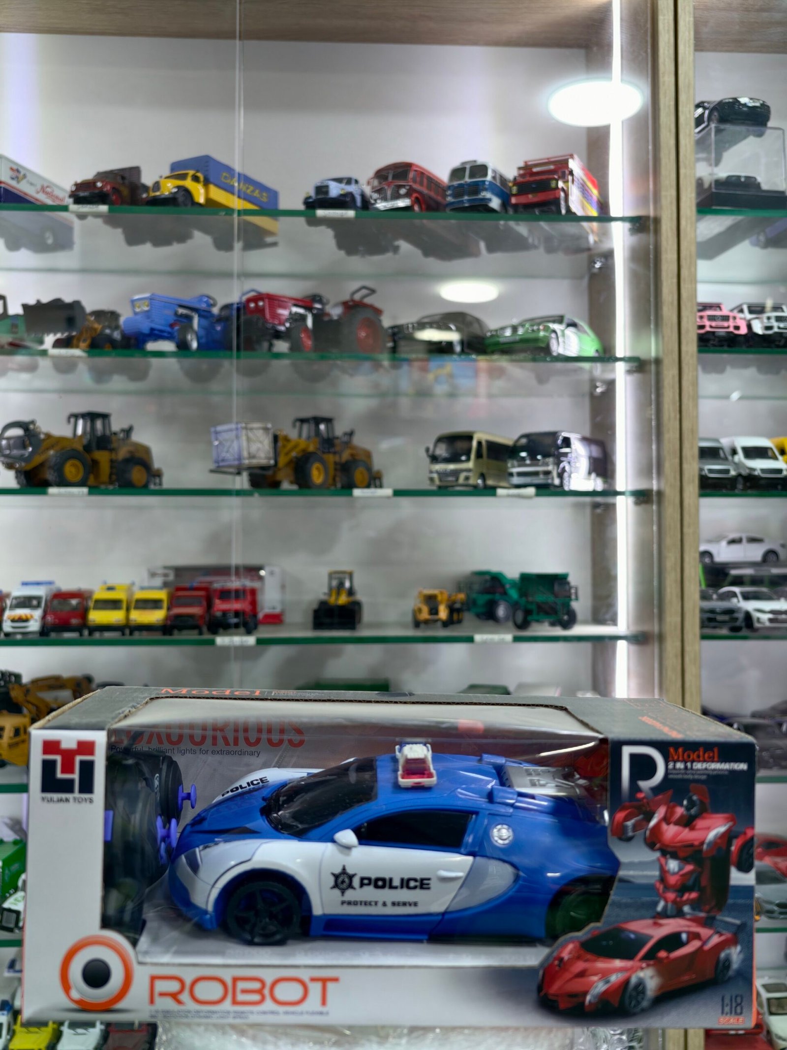 2025/12/1000024851-scaled.jpg R/c transformers police car – Image 1