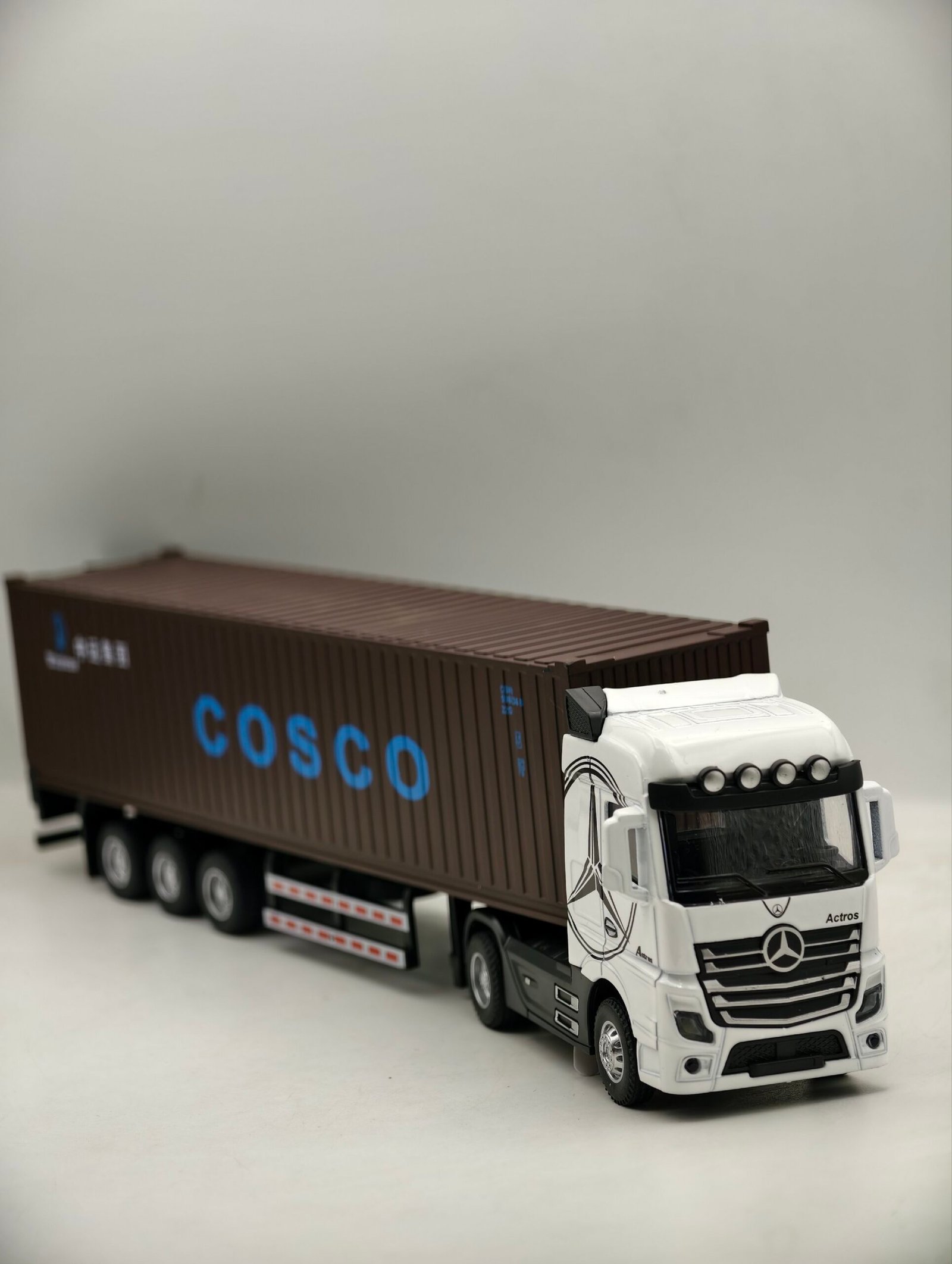 2026/06/1000057757-scaled.jpg camion conteneur 32cm tête métal – Image 1